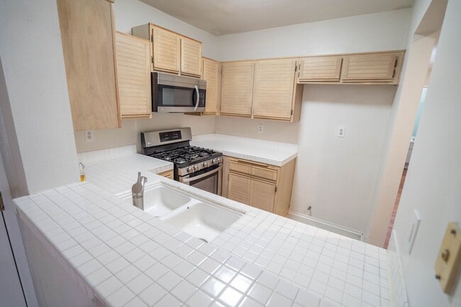 Photo - COMING SOON! 2-Bedroom Condo with some Uti... Unit 211