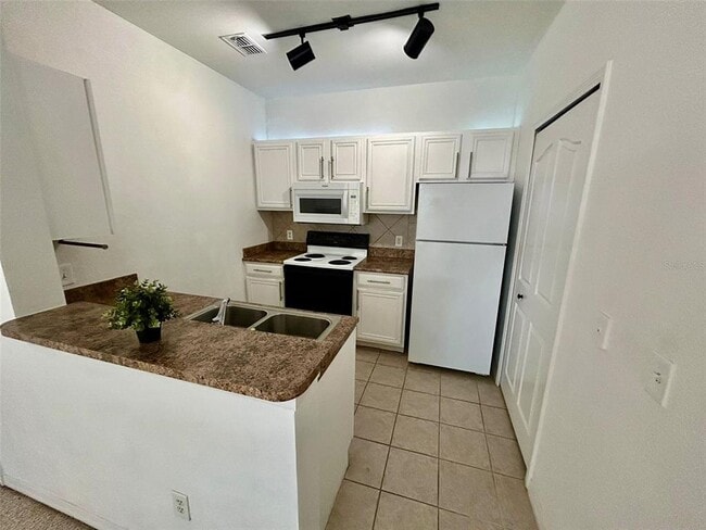 Photo - 6137 Metrowest Blvd Unit 304