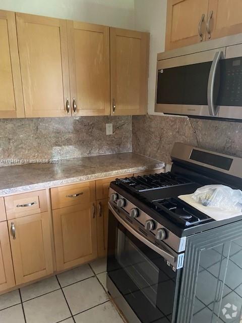 Building Photo - 1330 W 54th St Unit 107C Rental