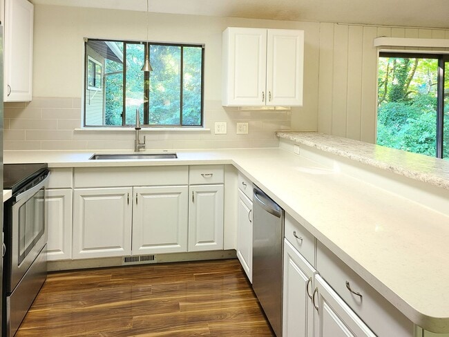 Photo - Collins View home- minutes to Lewis and Clark college! Featuring a basketball court, upgrades thr...