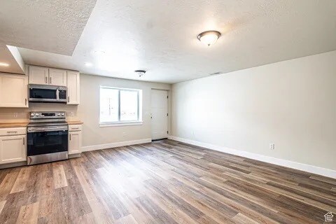 Living room with kitchen attached - 530 W 900 S Unit B