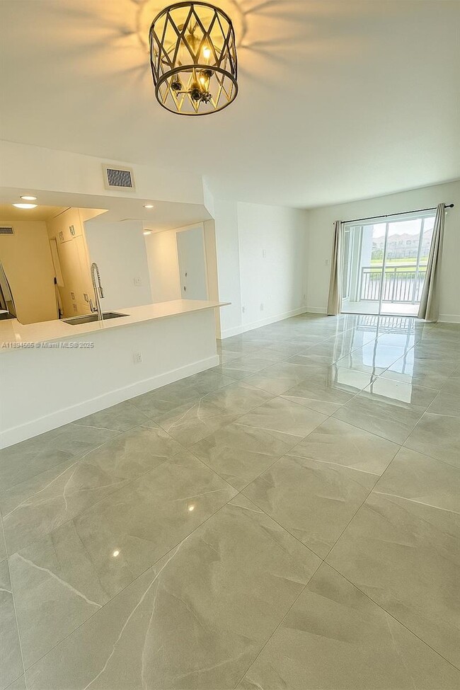 Building Photo - 8680 SW 212th St Unit 206