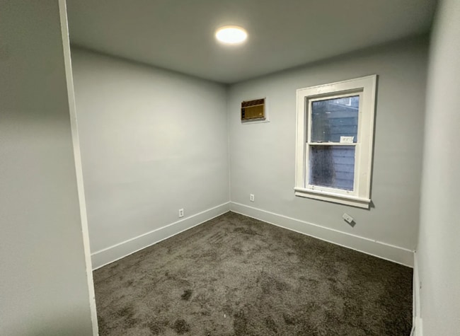 Photo - Charming 2-Bedroom Apartment in a Classic Two-Family Home