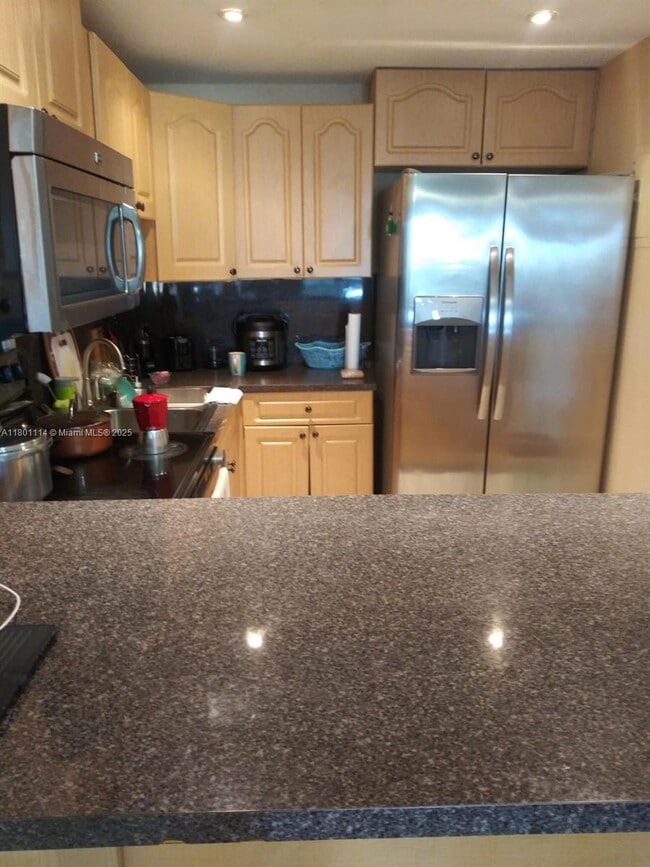 Photo - 6095 W 19th Ave Unidad 407 Rental