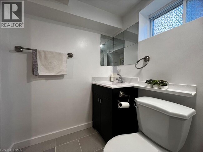 Photo - 4424 SIXTH Avenue Unit# BSMT