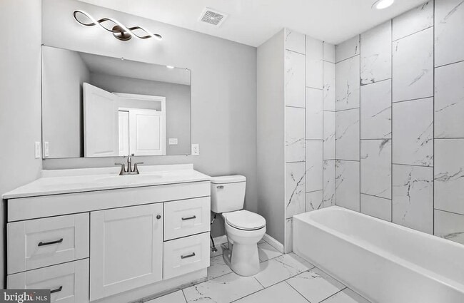 Photo - East District 3 BR/3.5 BA End Row Home w-Private Parking