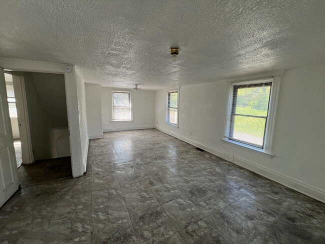 Photo - Spacious 4-Bed Cincinnati Home with Huge Yard, Attic & Basement | Newly Renovated