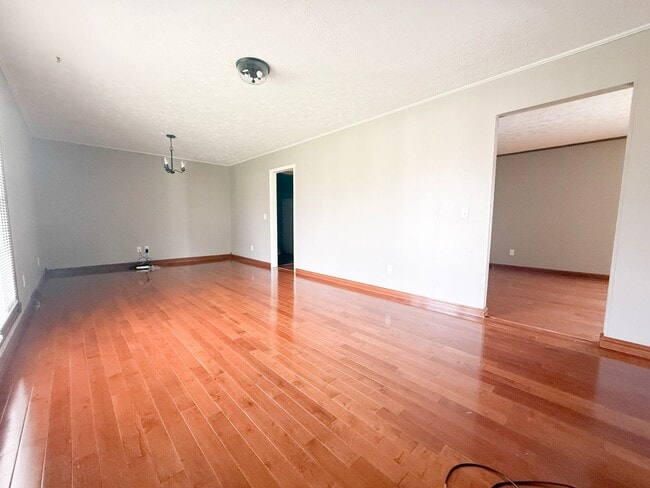 Photo - Spacious 3-Bedroom Home with Huge Yard, Covered Porches & Storage Building