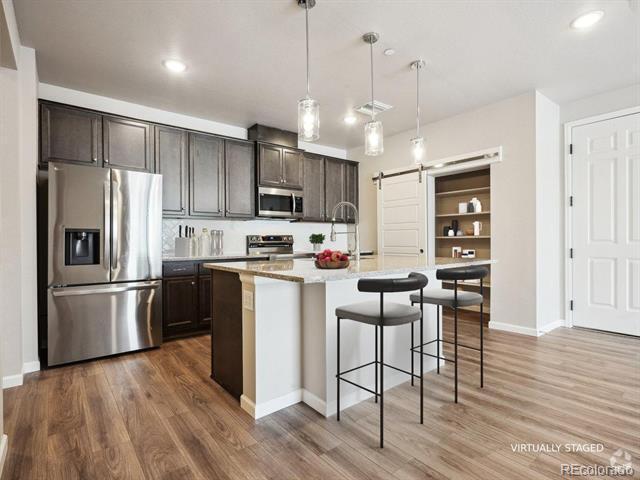 Building Photo - 6153 N Ceylon St Unit 303 Rental