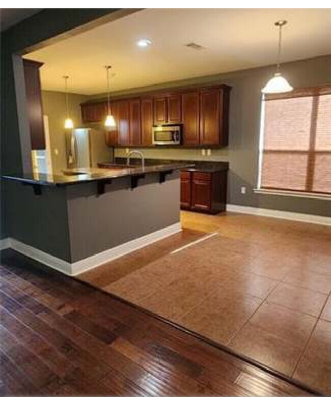 Dining room adjacent to kitchen. - 39152 Cajun Bayou Ave