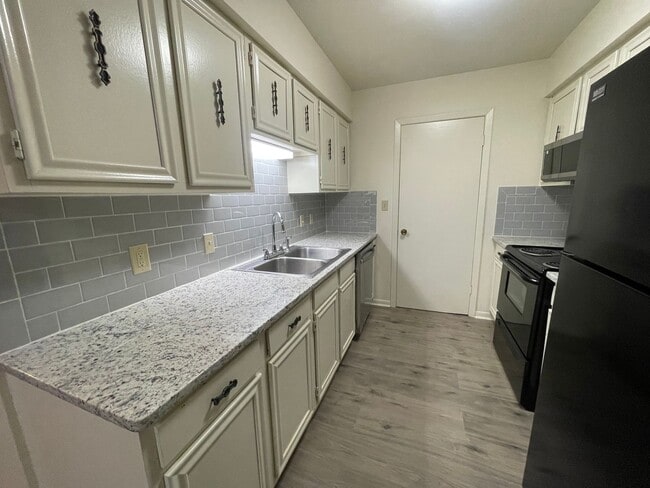 Photo - A Great Place to Call Home! Master Bedroom and Bath Downstairs!