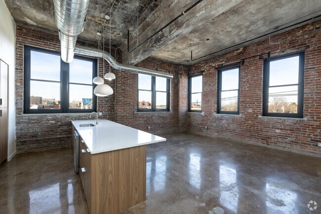1BR, 1BA - 1,125SF - Living Room - Tate Apartments