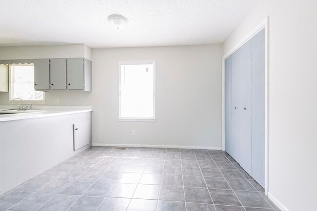 Photo - Adorable ranch home with huge fenced yard mid June!