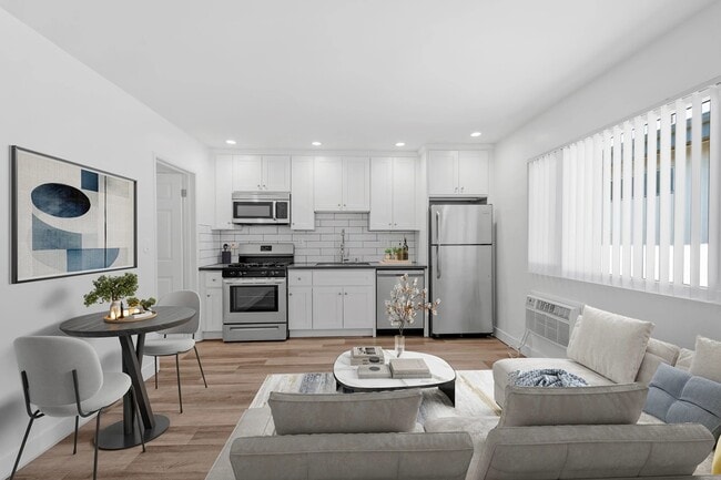 Building Photo - 1240 W 29th St Unit 16