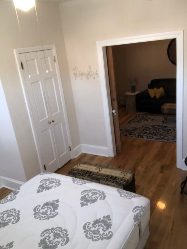 Front Bedroom looking into living room - 400 W Gay St Unit A