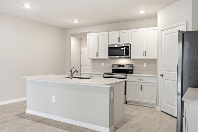 "Spacious 4-Bedroom Gem with 2 Full Baths in Charming Punta Gorda Oasis!"