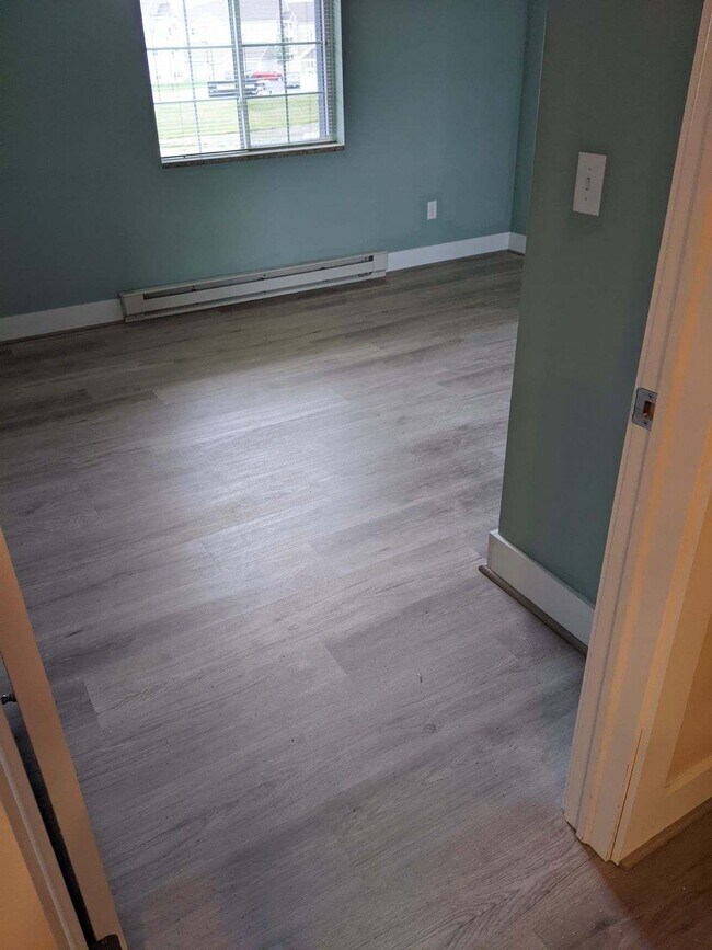 luxury vinyl floor thought out the unit - 1410 Landrush Way Unidad 1410