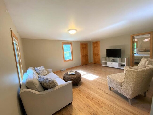 Living room with hwf - N40W27368 Glacier Rd Unit Upper