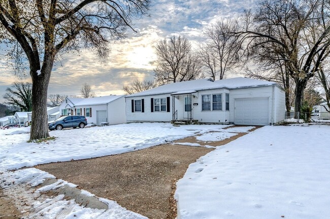 Photo - Charming 3-Bedroom Home with Garage, Basement & Fenced Backyard