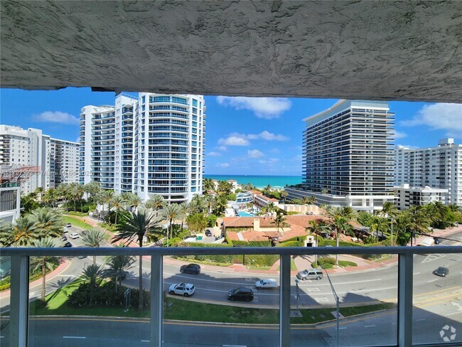Building Photo - 5900 Collins Ave Unit 906 Rental