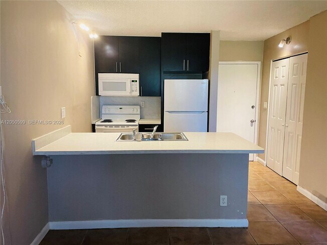2401 Riverside Dr Unit 114-B