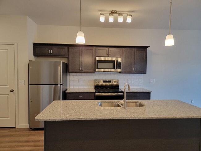 Madison Floor Plan - Kitchen (Wood Cabinets) - Red Mill Crossings