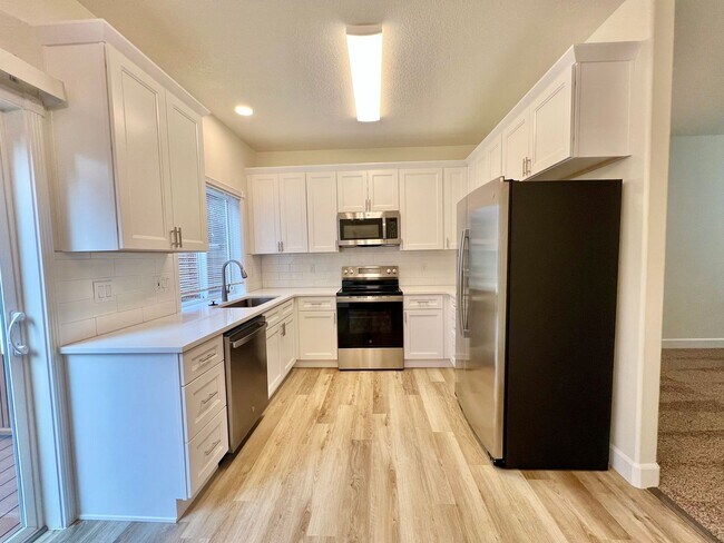 Photo - NEWLY RENOVATED! Spacious 2-Bedroom Townhome in a Charming Cul-de-Sac!