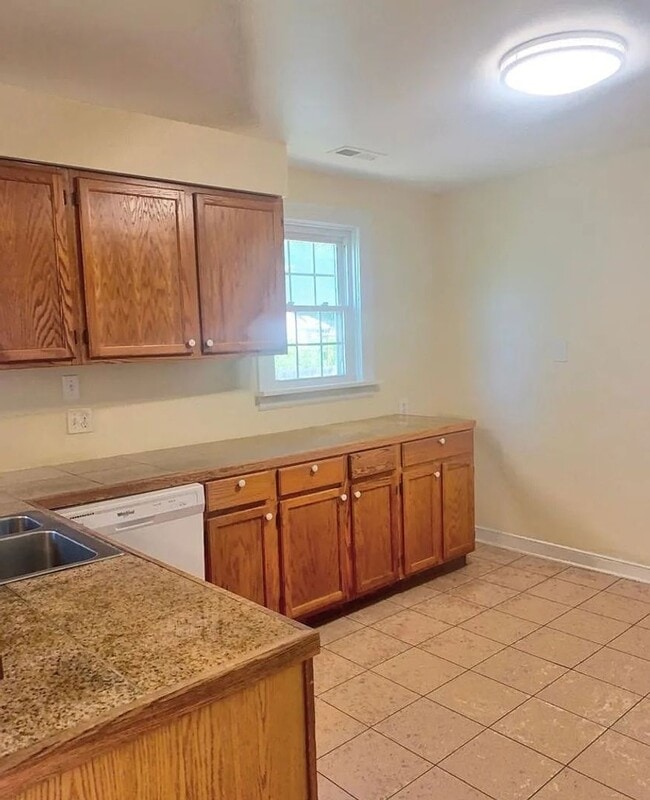 Photo - Super Cute 3 bed 2 bath Rancher with detached Garage and alley access.