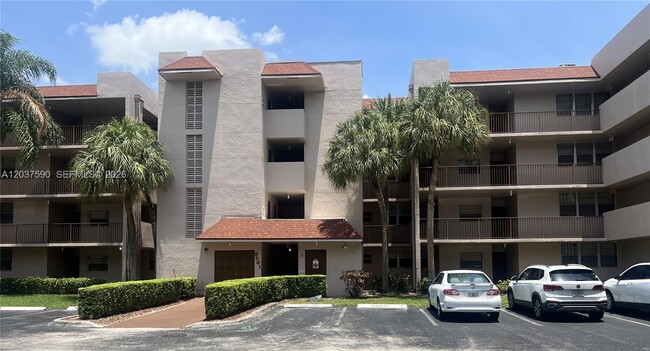 Building Photo - 9531 Seagrape Dr Unit 305