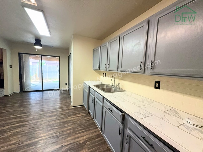 Photo - Cozy 3-Bedroom Home with Fireplace, Covered Patio & Large Fenced Backyard for Lease