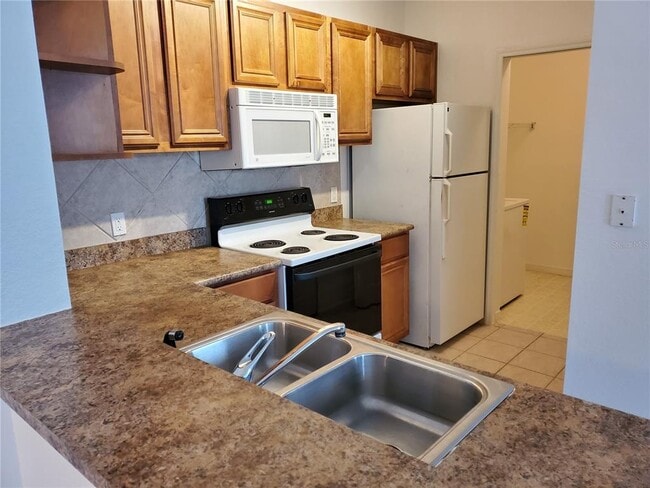 Photo - 8357 38th St Cir E Unidad 203
