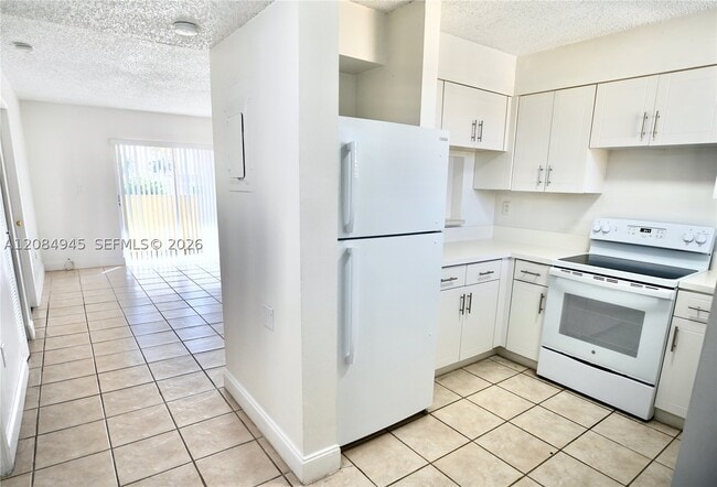 Building Photo - 14931 SW 82nd Ln Unit 18-401