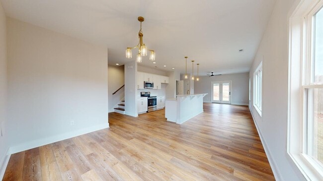 Dining room and kitchen (Photos courtesy of Century 21 ) - 157 Allure Dr Unit 157