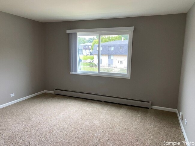 Photo - Carriage House Apartments LLC
