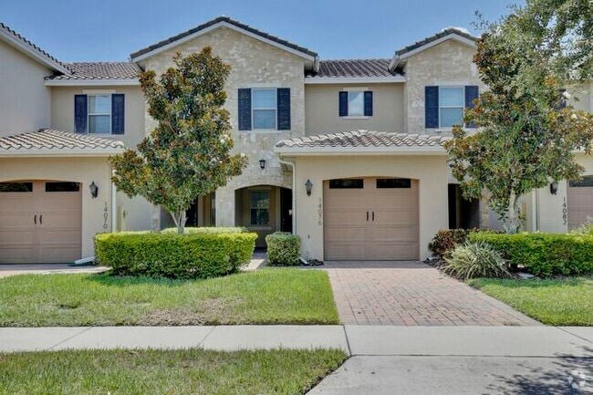 Building Photo - Elegant 2/2.5 Townhome in Guard-Gated Eagl...