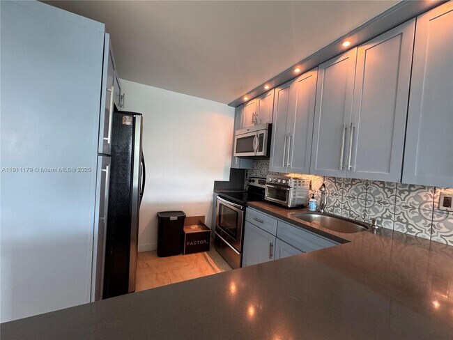 Photo - 8233 Harding Ave Unit 403