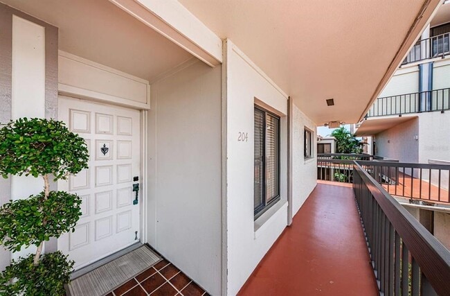 Building Photo - 6295 Bahia Del Mar Cir Unit 204