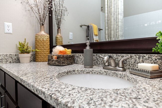 Bright bathroom with granite counters