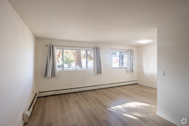 2BR, 2BA - 1,000SF - Living Room / Dining Room - Mainstreet Red Deer Apartments