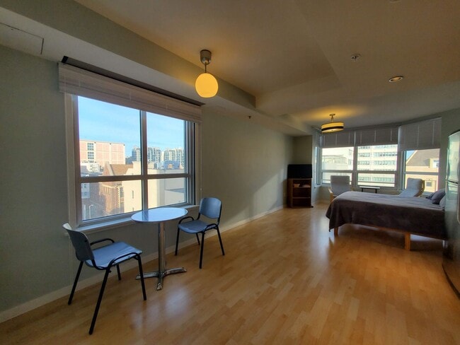 Photo - Downtown High-Rise Studio with parking and in-home laundry