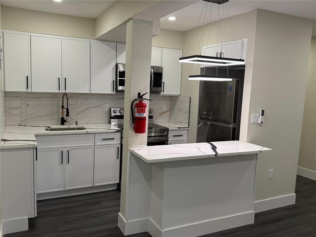 Photo - 19-49-49 80th St Unit 1R