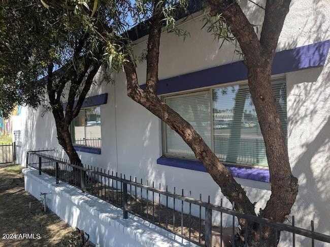 Building Photo - 4829 N 37th Ave Unit 4