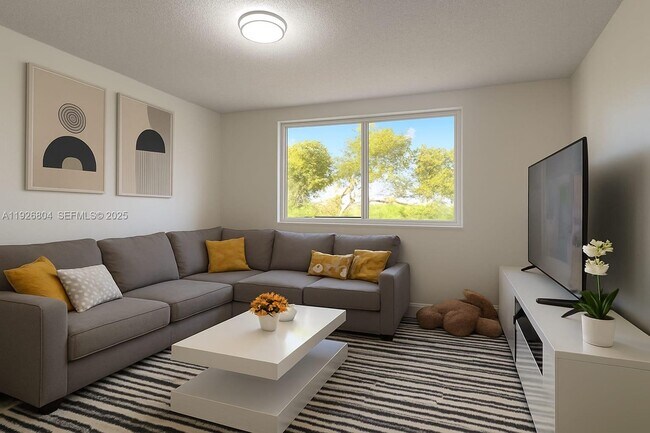 Building Photo - 666 W 81st St Unit 209