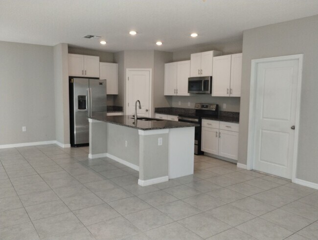 Photo - 4-bedroom, 2.5-bath home offering 1,881 square feet of comfortable living.