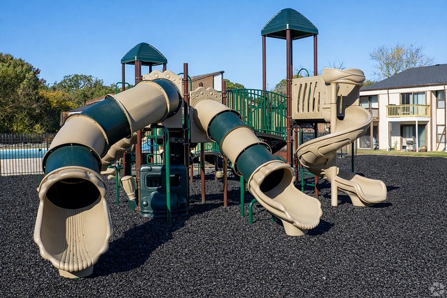Playground with spiral slides and pool
