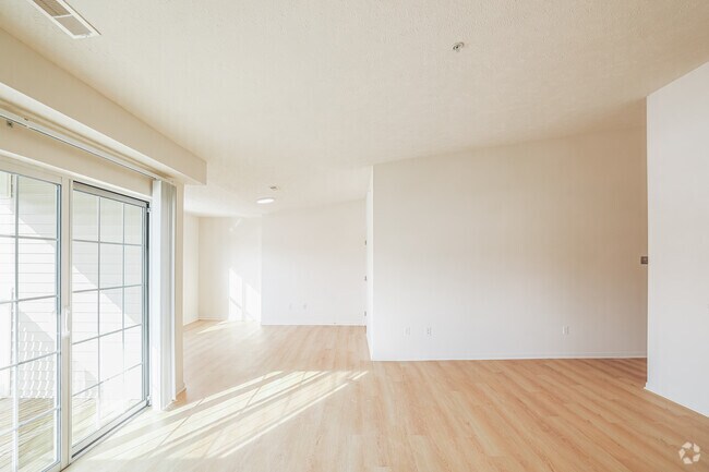 1BD, 1BA - 928SF - Dining Area and Living Room