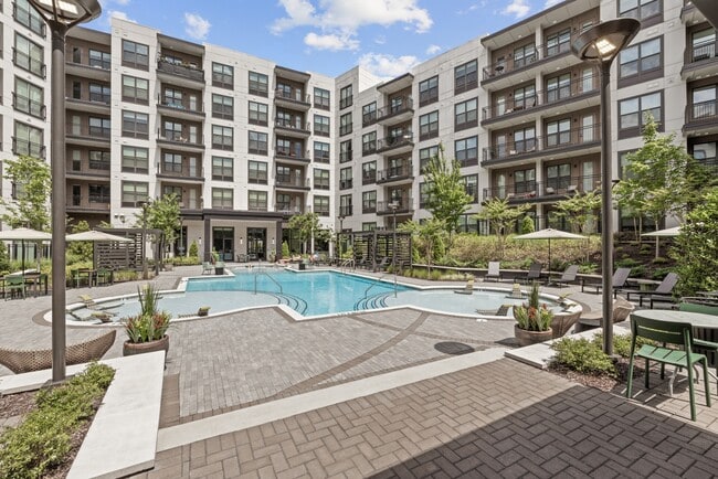Resort-style Swimming Pool with Tanning Ledge, Cabanas and Sundeck