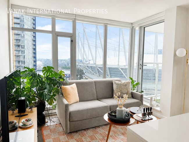 Photo - Bright 1 Bed + Den + Solarium | Pool, Gym & Rooftop Patio
