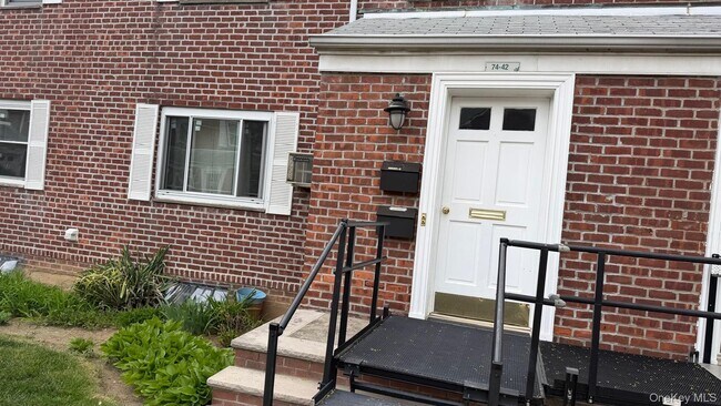 Building Photo - 74-42 260th St Unit 30G22