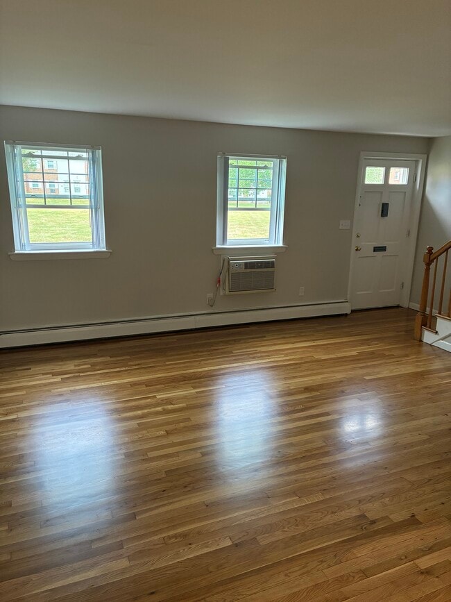 117 Living Room - Garden Style Apartments in a park like setting.